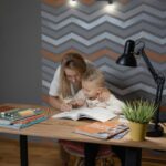 child learning, woman teaching kid