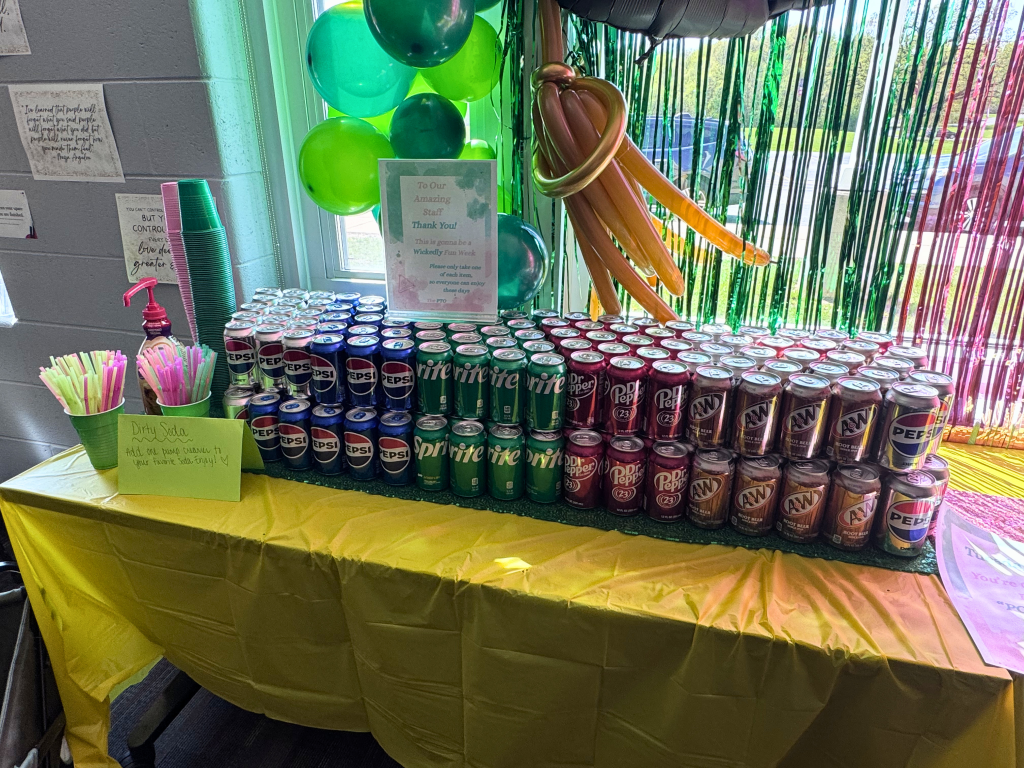 Dirty soda bar setup with a variety of canned drinks for staff appreciation week