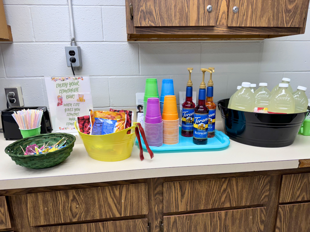 Lemonade bar setup with cups and drink options for staff appreciation week